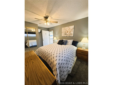 Enjoy effortless lake living in this well-kept, turn-key 1 bed on Sycamore Creek Golf Club in Missouri - for sale on GolfHomes.com, golf home, golf lot