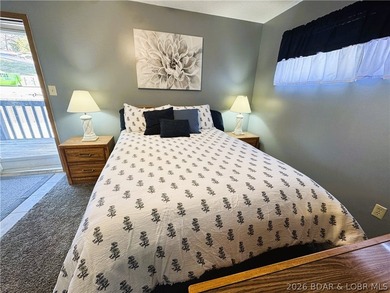 Enjoy effortless lake living in this well-kept, turn-key 1 bed on Sycamore Creek Golf Club in Missouri - for sale on GolfHomes.com, golf home, golf lot