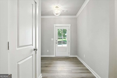 ONLY A FEW HOMES REMAIN IN THE LINKS SECTION OF TRADITOINS OF on Traditions of Braselton Golf Club in Georgia - for sale on GolfHomes.com, golf home, golf lot