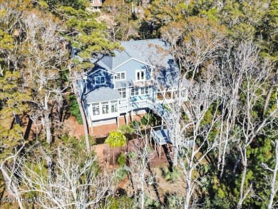 Experience the pinnacle of luxury living with this rare on Founders Club At St. James Plantation in North Carolina - for sale on GolfHomes.com, golf home, golf lot