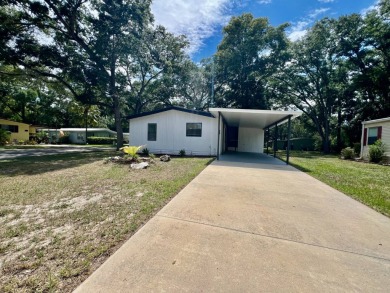 Home is located in Water Oak Country Club Estates in Lady Lake on Water Oak Country Club Estates in Florida - for sale on GolfHomes.com, golf home, golf lot