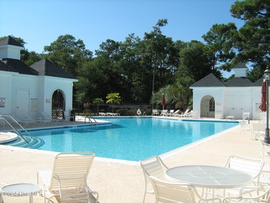 Beautiful waterfront homesite in a gated coastal community on Lockwood Folly Country Club in North Carolina - for sale on GolfHomes.com, golf home, golf lot