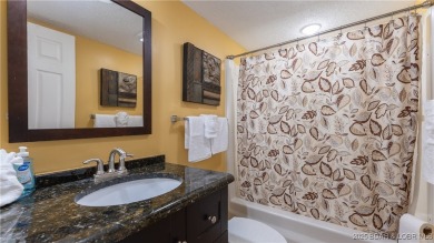 Located in the exclusive golf cart community of Tan Tar A on The Oaks Golf Course in Missouri - for sale on GolfHomes.com, golf home, golf lot