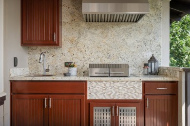 Discover refined island living with this beautifully updated top on Mauna Lani Resort Golf Course in Hawaii - for sale on GolfHomes.com, golf home, golf lot