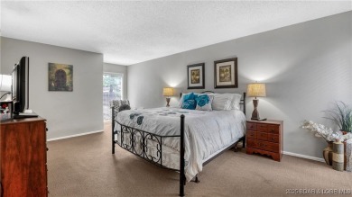 Located in the exclusive golf cart community of Tan Tar A on The Oaks Golf Course in Missouri - for sale on GolfHomes.com, golf home, golf lot
