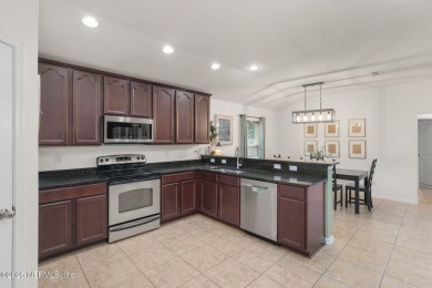 Welcome to this stunning home in Heritage Landing at World Golf on King and Bear Golf Course/World Golf Village in Florida - for sale on GolfHomes.com, golf home, golf lot