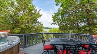 Located in the exclusive golf cart community of Tan Tar A on The Oaks Golf Course in Missouri - for sale on GolfHomes.com, golf home, golf lot