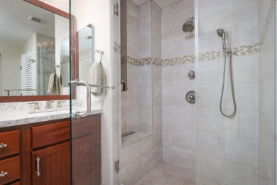 Discover refined island living with this beautifully updated top on Mauna Lani Resort Golf Course in Hawaii - for sale on GolfHomes.com, golf home, golf lot