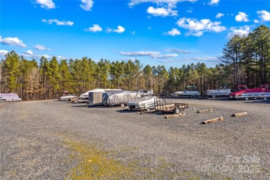 Located in the prestigious gated community of Heron Bay, this on Old North State Club at Uwharrie Point Golf community in North Carolina - for sale on GolfHomes.com, golf home, golf lot