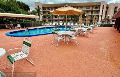 Beautiful Corner Unit with Golf Course View in a senior living on Sunrise Lakes Phase III in Florida - for sale on GolfHomes.com, golf home, golf lot