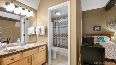 Located in the exclusive golf cart community of Tan Tar A on The Oaks Golf Course in Missouri - for sale on GolfHomes.com, golf home, golf lot