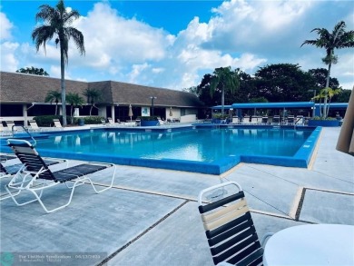 Beautiful Corner Unit with Golf Course View in a senior living on Sunrise Lakes Phase III in Florida - for sale on GolfHomes.com, golf home, golf lot