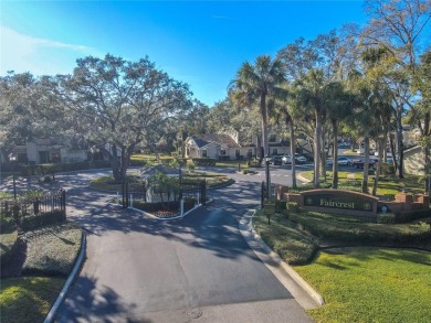 If you're looking for a move-in ready townhome in a great on Tampa Palms Golf and Country Club in Florida - for sale on GolfHomes.com, golf home, golf lot