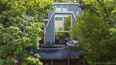 Located in the exclusive golf cart community of Tan Tar A on The Oaks Golf Course in Missouri - for sale on GolfHomes.com, golf home, golf lot