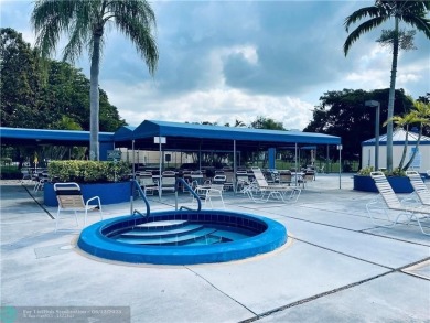 Beautiful Corner Unit with Golf Course View in a senior living on Sunrise Lakes Phase III in Florida - for sale on GolfHomes.com, golf home, golf lot