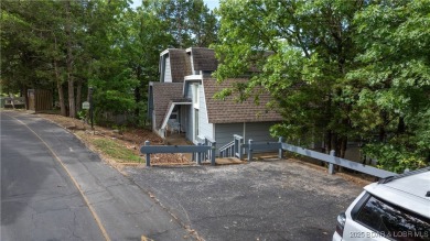 Located in the exclusive golf cart community of Tan Tar A on The Oaks Golf Course in Missouri - for sale on GolfHomes.com, golf home, golf lot
