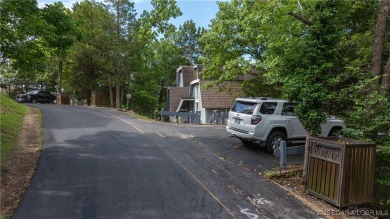 Located in the exclusive golf cart community of Tan Tar A on The Oaks Golf Course in Missouri - for sale on GolfHomes.com, golf home, golf lot