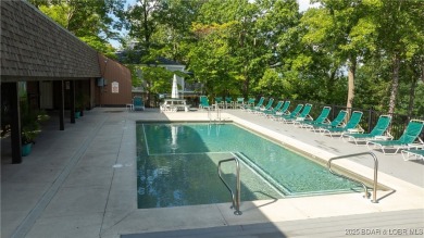 Located in the exclusive golf cart community of Tan Tar A on The Oaks Golf Course in Missouri - for sale on GolfHomes.com, golf home, golf lot