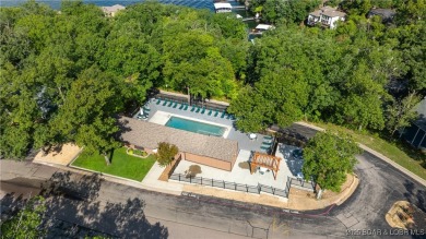 Located in the exclusive golf cart community of Tan Tar A on The Oaks Golf Course in Missouri - for sale on GolfHomes.com, golf home, golf lot