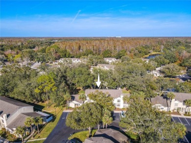 If you're looking for a move-in ready townhome in a great on Tampa Palms Golf and Country Club in Florida - for sale on GolfHomes.com, golf home, golf lot