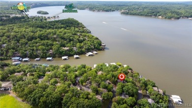 Located in the exclusive golf cart community of Tan Tar A on The Oaks Golf Course in Missouri - for sale on GolfHomes.com, golf home, golf lot