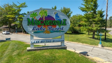 Located in the exclusive golf cart community of Tan Tar A on The Oaks Golf Course in Missouri - for sale on GolfHomes.com, golf home, golf lot