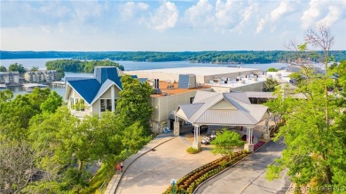 Located in the exclusive golf cart community of Tan Tar A on The Oaks Golf Course in Missouri - for sale on GolfHomes.com, golf home, golf lot