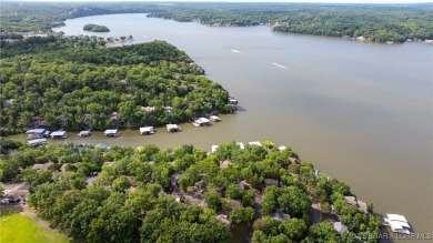 Located in the exclusive golf cart community of Tan Tar A on The Oaks Golf Course in Missouri - for sale on GolfHomes.com, golf home, golf lot