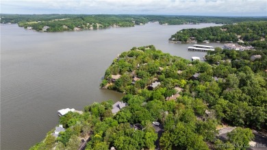 Located in the exclusive golf cart community of Tan Tar A on The Oaks Golf Course in Missouri - for sale on GolfHomes.com, golf home, golf lot