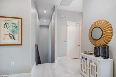 Exquisitely renovated second-floor residence offered fully on The Rookery At Marco in Florida - for sale on GolfHomes.com, golf home, golf lot