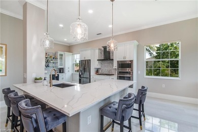 Exquisitely renovated second-floor residence offered fully on The Rookery At Marco in Florida - for sale on GolfHomes.com, golf home, golf lot