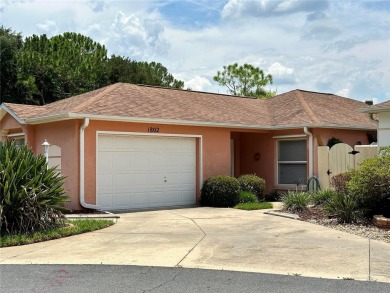 BOND PAID! Welcome home to Your RETREAT with an incredible view! on Tierra Del Sol Golf and Country Club in Florida - for sale on GolfHomes.com, golf home, golf lot