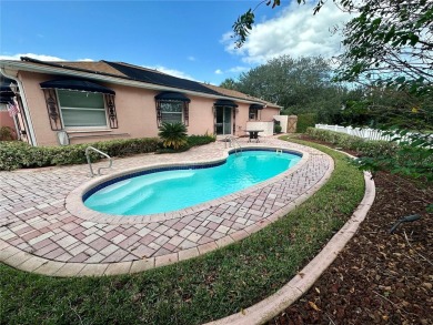 BOND PAID! Welcome home to Your RETREAT with an incredible view! on Tierra Del Sol Golf and Country Club in Florida - for sale on GolfHomes.com, golf home, golf lot