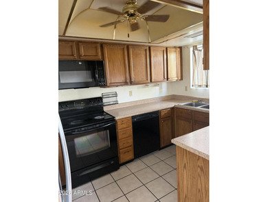 Beautiful 3 bedroom, 3 bathroom tri-level townhome, Great Value on Dobson Ranch Municipal Golf Course in Arizona - for sale on GolfHomes.com, golf home, golf lot