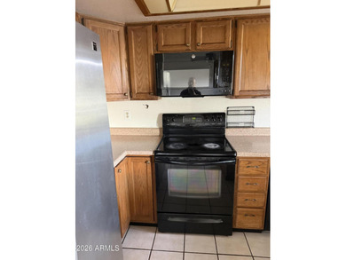 Beautiful 3 bedroom, 3 bathroom tri-level townhome, Great Value on Dobson Ranch Municipal Golf Course in Arizona - for sale on GolfHomes.com, golf home, golf lot