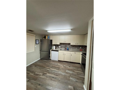 Calling All Investors!! 7 income producing units to be sold as a on Country Club At Silver Springs Shores in Florida - for sale on GolfHomes.com, golf home, golf lot