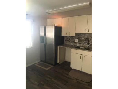 Calling All Investors!! 7 income producing units to be sold as a on Country Club At Silver Springs Shores in Florida - for sale on GolfHomes.com, golf home, golf lot