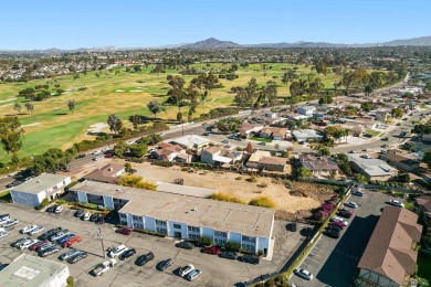 This cozy move-in ready 1-bedroom, 1-bath condo features on San Diego Country Club in California - for sale on GolfHomes.com, golf home, golf lot