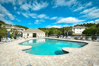Discover coastal comfort in this well-appointed 2-bed, 2-bath on Barefoot Resort and Golf Club  in South Carolina - for sale on GolfHomes.com, golf home, golf lot