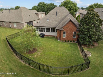 Welcome to this stunning 4-bedroom, 3-bathroom red brick home on Ironwood Golf and Country Club in North Carolina - for sale on GolfHomes.com, golf home, golf lot