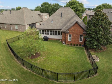 Welcome to this beautiful 4-bed, 3-bath red brick home in the on Ironwood Golf and Country Club in North Carolina - for sale on GolfHomes.com, golf home, golf lot