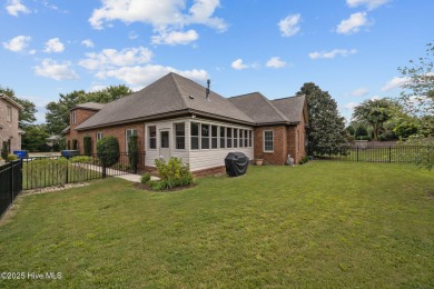 Welcome to this stunning 4-bedroom, 3-bathroom red brick home on Ironwood Golf and Country Club in North Carolina - for sale on GolfHomes.com, golf home, golf lot