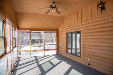 Welcome to your serene getaway, nestled in a quiet, picturesque on Calamus Golf Course in Nebraska - for sale on GolfHomes.com, golf home, golf lot