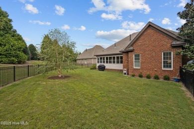 Welcome to this stunning 4-bedroom, 3-bathroom red brick home on Ironwood Golf and Country Club in North Carolina - for sale on GolfHomes.com, golf home, golf lot