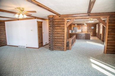 Welcome to your serene getaway, nestled in a quiet, picturesque on Calamus Golf Course in Nebraska - for sale on GolfHomes.com, golf home, golf lot