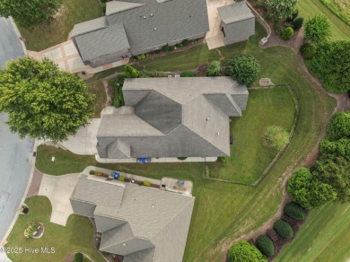 Welcome to this stunning 4-bedroom, 3-bathroom red brick home on Ironwood Golf and Country Club in North Carolina - for sale on GolfHomes.com, golf home, golf lot