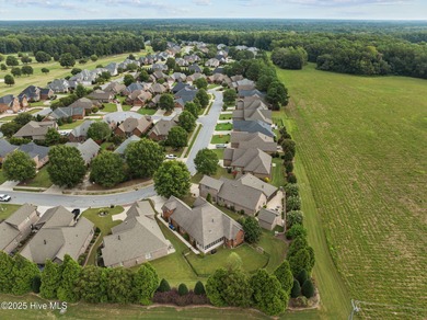 Welcome to this beautiful 4-bed, 3-bath red brick home in the on Ironwood Golf and Country Club in North Carolina - for sale on GolfHomes.com, golf home, golf lot