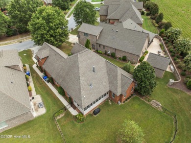 Welcome to this stunning 4-bedroom, 3-bathroom red brick home on Ironwood Golf and Country Club in North Carolina - for sale on GolfHomes.com, golf home, golf lot