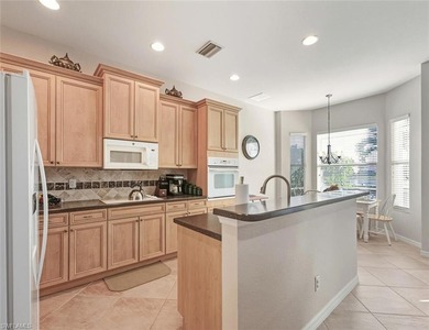 Welcome to resort-style living in The Cascades at River Hall, a on River Hall Country Club in Florida - for sale on GolfHomes.com, golf home, golf lot