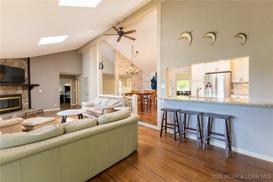 Located in the iconic Tan Tar A Estates, just steps from on The Oaks Golf Course in Missouri - for sale on GolfHomes.com, golf home, golf lot